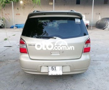 Nissan Grand livina 2010 - Bán ô tô Nissan Grand livina sản xuất 2010, màu bạc, giá 280tr