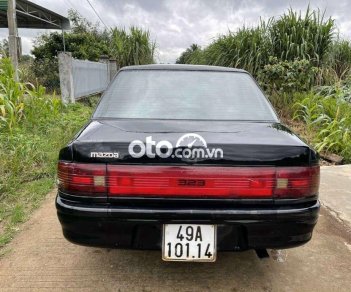 Mazda 323 1995 - Cần bán lại xe Mazda 323 năm sản xuất 1995, màu đen, nhập khẩu