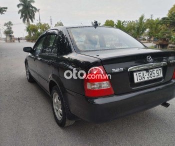 Mazda 323 2004 - Cần bán lại xe Mazda 323 sản xuất năm 2004, màu đen, giá 150tr