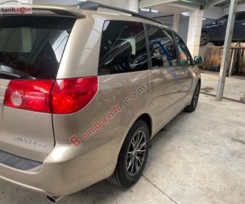 Toyota Sienna 2009 - Cần bán xe Toyota Sienna sản xuất năm 2009, màu vàng, nhập khẩu