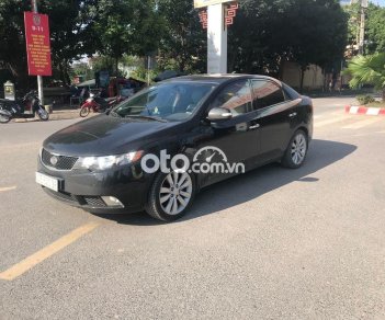 Kia Forte  Sli  2009 - Cần bán Kia Forte Sli năm 2009, màu đen, nhập khẩu số tự động