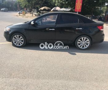 Kia Forte  Sli  2009 - Cần bán Kia Forte Sli năm 2009, màu đen, nhập khẩu số tự động