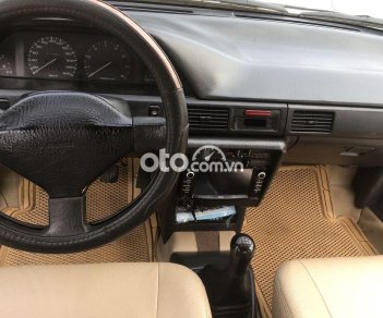 Mazda 323 1997 - Cần bán lại xe Mazda 323 đời 1997, màu trắng, xe nhập  