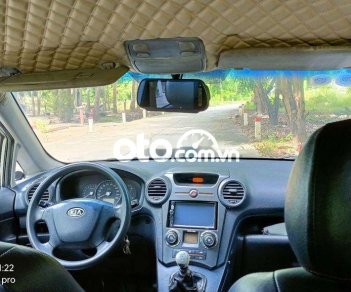 Kia Carens 2.0MT 2010 - Bán xe Kia Carens 2.0MT sản xuất 2010, màu bạc ít sử dụng