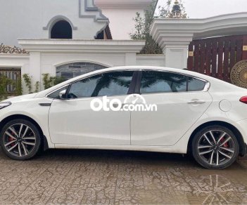 Kia K3 2.0 2015 - Cần bán xe Kia K3 2.0AT năm 2015, màu trắng