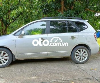 Kia Carens 2.0MT 2010 - Bán xe Kia Carens 2.0MT sản xuất 2010, màu bạc ít sử dụng