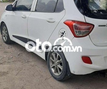 Hyundai Grand i10 2014 - Bán Hyundai Grand i10 năm 2014, màu trắng, xe nhập