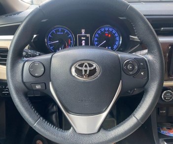 Toyota Corolla   2016 - Bán xe Toyota Corolla Altis đời 2016, màu bạc còn mới