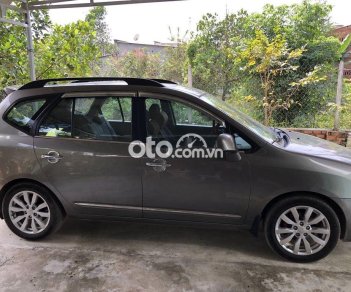 Kia Carens SX 2.0AT 2010 - Bán Kia Carens SX 2.0AT sản xuất năm 2010, màu xám xe gia đình