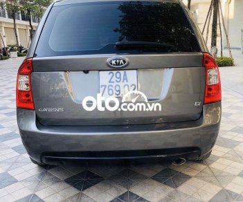 Kia Carens MT 2013 - Cần bán Kia Carens MT đời 2013, màu xám còn mới, 262 triệu