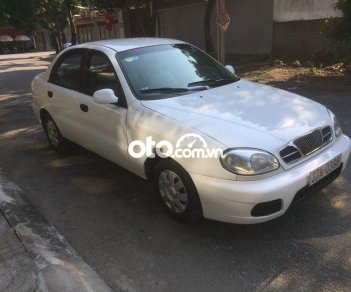 Daewoo Lanos 2004 - Cần bán xe Daewoo Lanos đời 2004, màu trắng