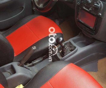 Daewoo Lanos 2004 - Bán ô tô Daewoo Lanos MT đời 2004, màu bạc