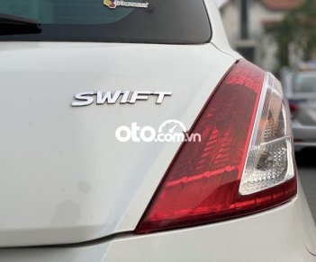 Suzuki Swift AT 2014 - Cần bán lại xe Suzuki Swift AT đời 2014, màu trắng, giá 450tr