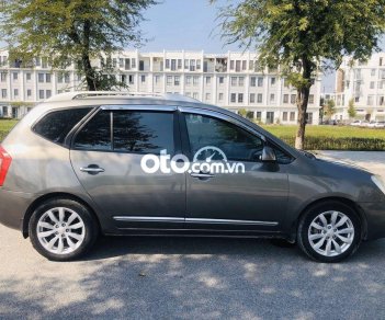 Kia Carens MT 2013 - Cần bán Kia Carens MT đời 2013, màu xám còn mới, 262 triệu