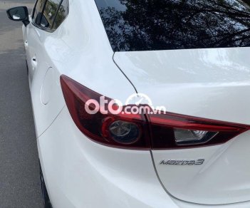 Mazda 3 AT 2015 - Cần bán gấp Mazda 3 AT năm 2015, màu trắng ít sử dụng