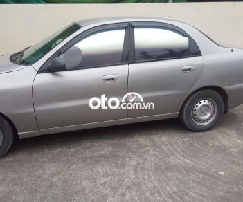 Daewoo Lanos 2004 - Bán ô tô Daewoo Lanos MT đời 2004, màu bạc