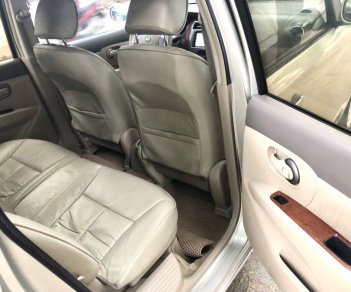 Nissan Grand livina 2010 - Bán Nissan Grand Livina 7 chỗ số tự động màu vàng cát xe gia đình chính chủ còn rất đẹp và nguyên bản - 89000 km - 290tr