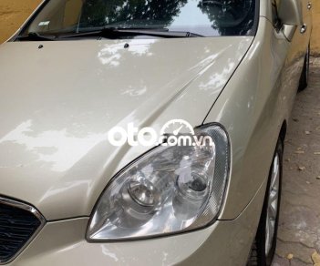 Kia Carens 2012 - Cần bán gấp Kia Carens SX năm 2012, màu ghi vàng