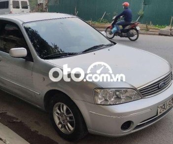 Ford Laser 2004 - Cần bán lại xe Ford Laser 1.6MT đời 2004, màu bạc, giá 130tr