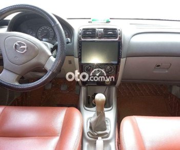 Mazda 626 MT 2001 - Bán Mazda 626 MT đời 2001, màu đen, nhập khẩu nguyên chiếc, giá chỉ 125 triệu