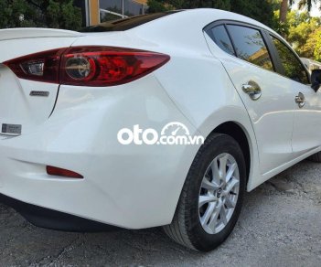 Mazda 3 2018 - Cần bán gấp Mazda 3 1.5L Deluxe năm sản xuất 2018, màu trắng, 555tr