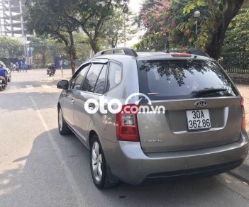 Kia Carens 2009 - Cần bán Kia Carens 2.0 MT đời 2009, màu xám còn mới