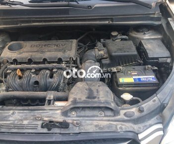 Kia Carens 2009 - Cần bán Kia Carens 2.0 MT đời 2009, màu xám còn mới