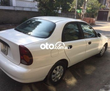 Daewoo Lanos 2004 - Cần bán xe Daewoo Lanos đời 2004, màu trắng