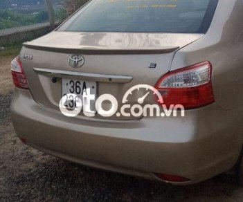 Toyota Vios 2009 - Cần bán gấp Toyota Vios đời 2014, màu vàng cát