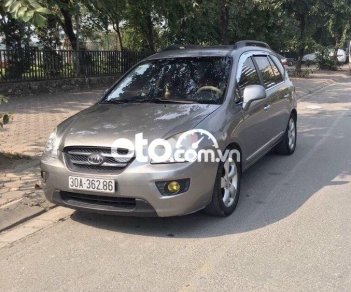 Kia Carens 2009 - Cần bán Kia Carens 2.0 MT đời 2009, màu xám còn mới