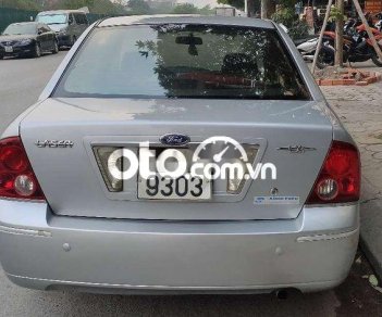 Ford Laser 2004 - Cần bán lại xe Ford Laser 1.6MT đời 2004, màu bạc, giá 130tr