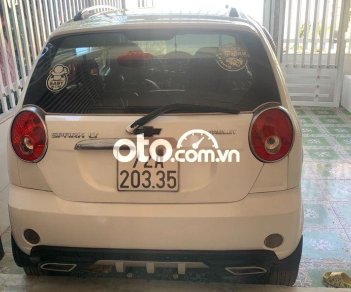 Chevrolet Spark  MT 2009 - Cần bán gấp Chevrolet Spark MT năm sản xuất 2009, màu trắng, giá tốt