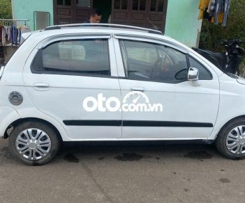 Chevrolet Spark MT 2009 - Cần bán gấp Chevrolet Spark MT sản xuất 2009, màu trắng còn mới giá cạnh tranh