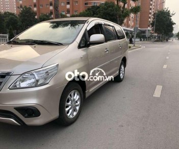 Toyota Innova MT 2014 - Cần bán gấp Toyota Innova MT sản xuất năm 2014, màu bạc  