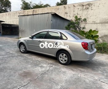 Chevrolet Lacetti MT 2011 - Cần bán xe Chevrolet Lacetti MT năm 2011, màu bạc