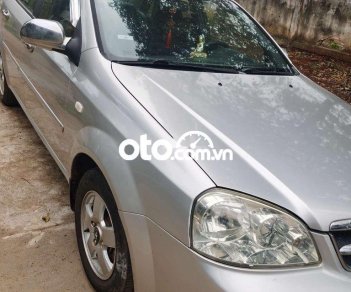 Daewoo Lacetti  MT 2010 - Bán ô tô Daewoo Lacetti MT năm 2010, màu bạc 