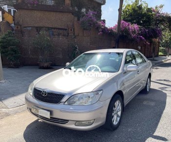 Toyota Camry   2.4G  MT 2004 - Bán xe Toyota Camry 2.4G  MT năm 2004, màu bạc giá cạnh tranh