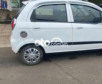 Chevrolet Spark MT 2009 - Cần bán gấp Chevrolet Spark MT sản xuất 2009, màu trắng còn mới giá cạnh tranh