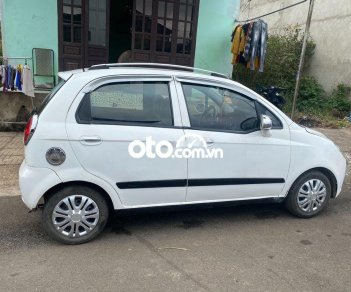 Chevrolet Spark MT 2009 - Cần bán gấp Chevrolet Spark MT sản xuất 2009, màu trắng còn mới giá cạnh tranh