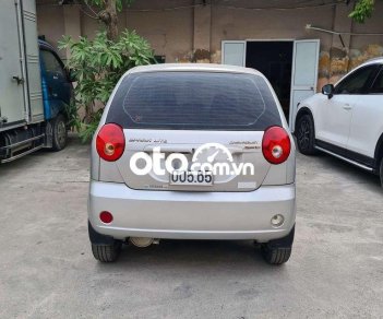 Chevrolet Spark MT 2012 - Cần bán lại xe Chevrolet Spark MT sản xuất 2012, màu bạc, giá tốt