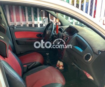 Chevrolet Spark  MT 2009 - Cần bán gấp Chevrolet Spark MT năm sản xuất 2009, màu trắng, giá tốt