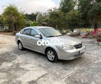 Chevrolet Lacetti MT 2011 - Cần bán xe Chevrolet Lacetti MT năm 2011, màu bạc