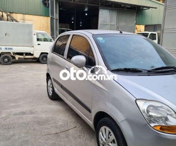 Chevrolet Spark MT 2012 - Cần bán lại xe Chevrolet Spark MT sản xuất 2012, màu bạc, giá tốt