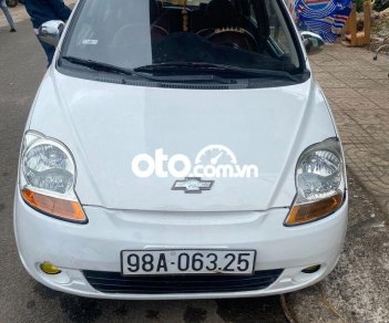 Chevrolet Spark MT 2009 - Cần bán gấp Chevrolet Spark MT sản xuất 2009, màu trắng còn mới giá cạnh tranh