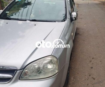 Daewoo Lacetti  MT 2010 - Bán ô tô Daewoo Lacetti MT năm 2010, màu bạc 