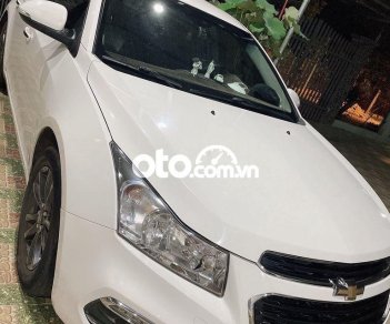 Chevrolet Cruze MT 2016 - Cần bán xe Chevrolet Cruze MT sản xuất 2016, màu trắng xe gia đình