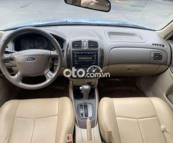 Ford Laser   1.8AT 2004 - Cần bán Ford Laser 1.8AT sản xuất 2004, màu bạc, xe nhập  