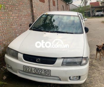 Mazda 323 MT 2000 - Bán Mazda 323 MT năm 2000, màu trắng, nhập khẩu nguyên chiếc, giá tốt