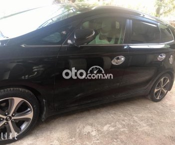 Kia Rondo AT 2016 - Bán Kia Rondo AT sản xuất năm 2016, màu đen xe gia đình