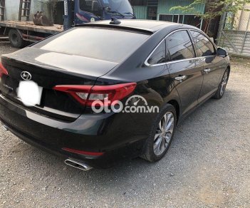 Hyundai Sonata AT 2014 - Bán xe Hyundai Sonata AT sản xuất 2014, màu đen, 495 triệu